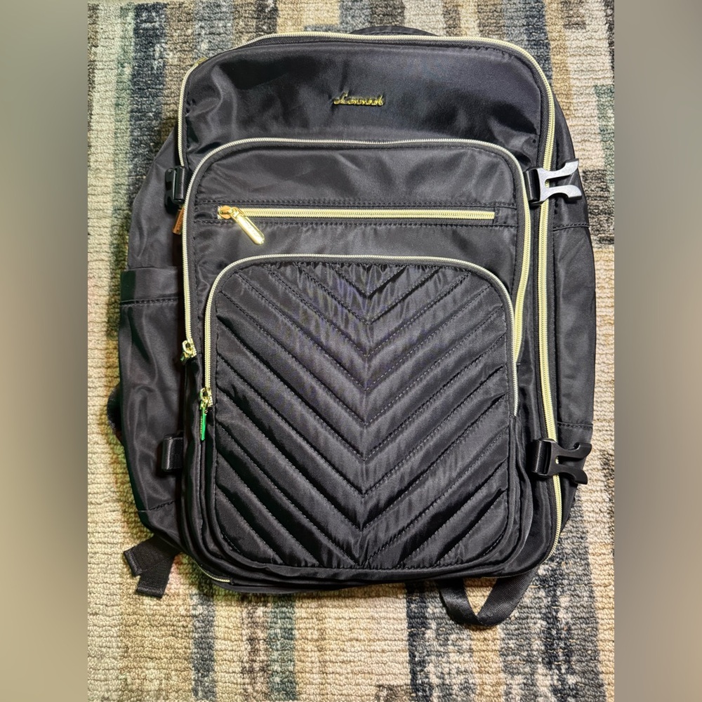 Stylish Black Backpack with Gold Accents